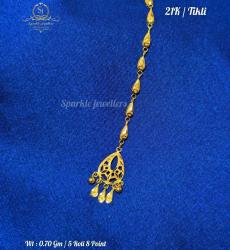 21 Karat Gold Tickly